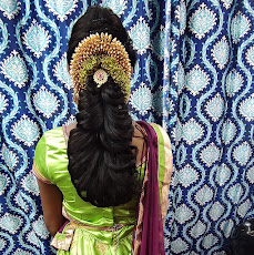 Sharmi Beauty Parlour bridal hairstyle